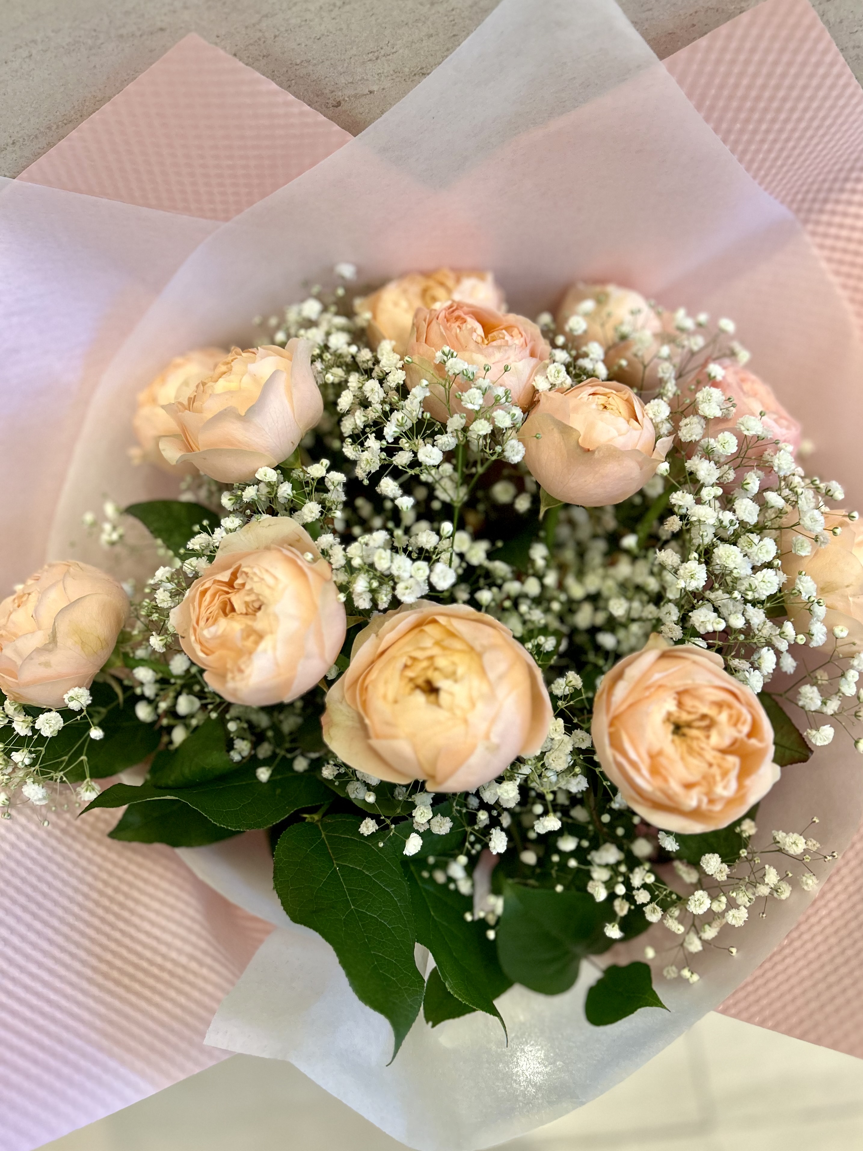 ROSE1215. A dozen garden roses in the fancy paper wrapping